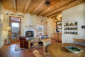 Fireplace and dining table in the Cedar Casita