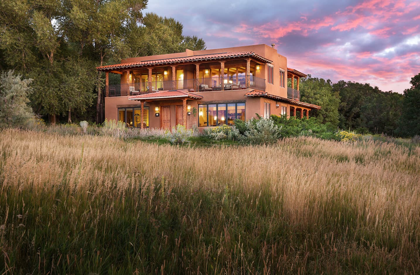 Spring House exterior at sunset