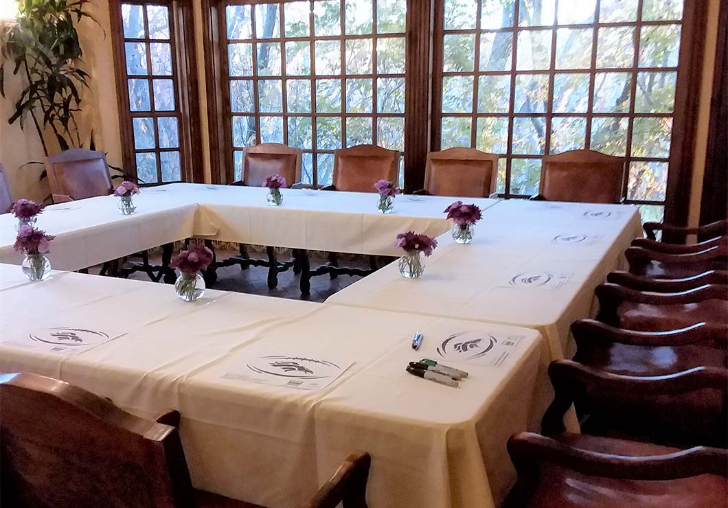 A large room set up for a board meeting