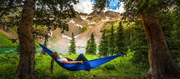 Woman lounging on a hammock in Colorado